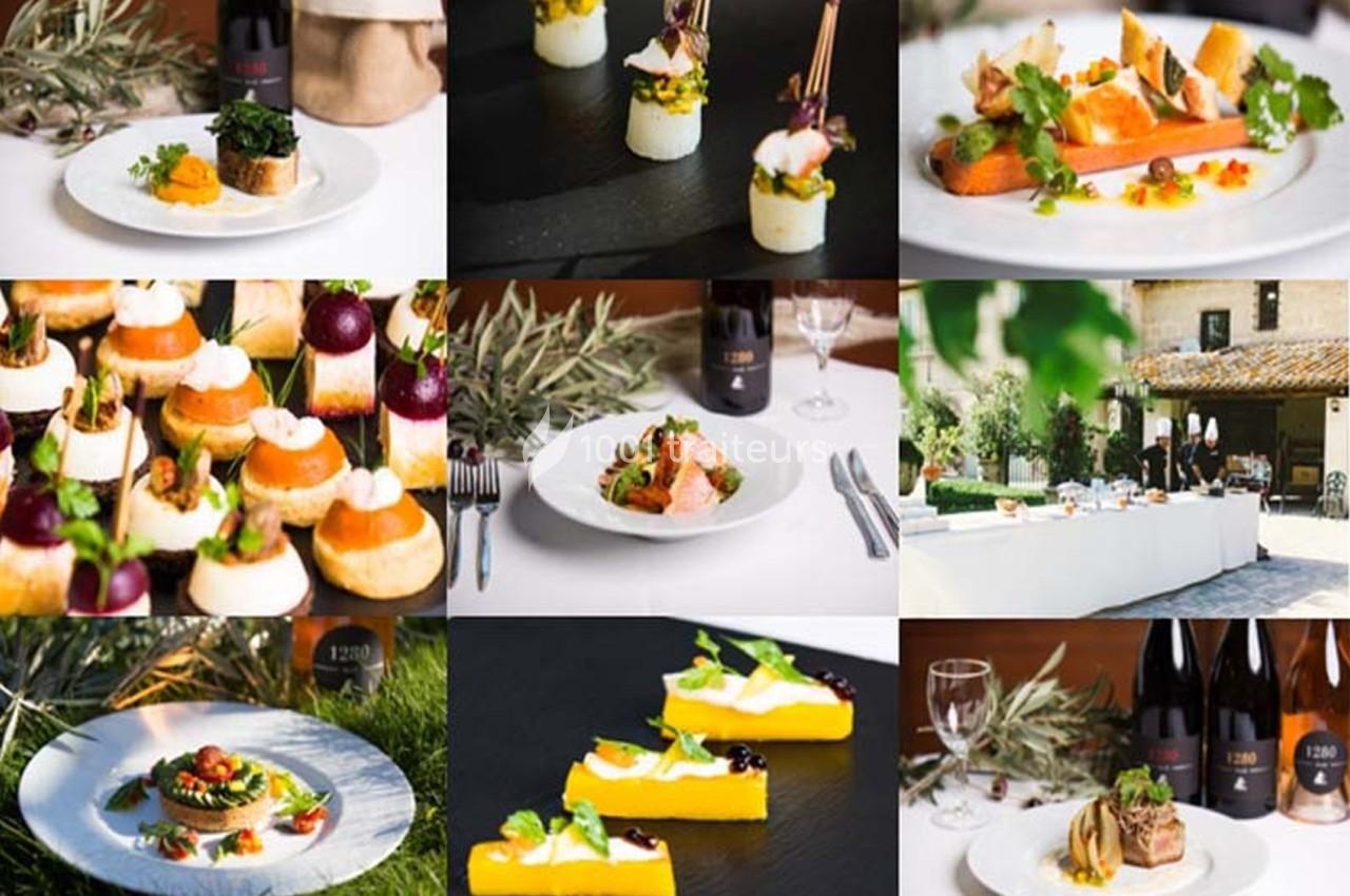 Traiteur Monsieur Louis Traiteur Marsillargues #1 Assortiment de plats gastronomiques présentés sur des assiettes, avec une table dressée en extérieur en arrière-plan.